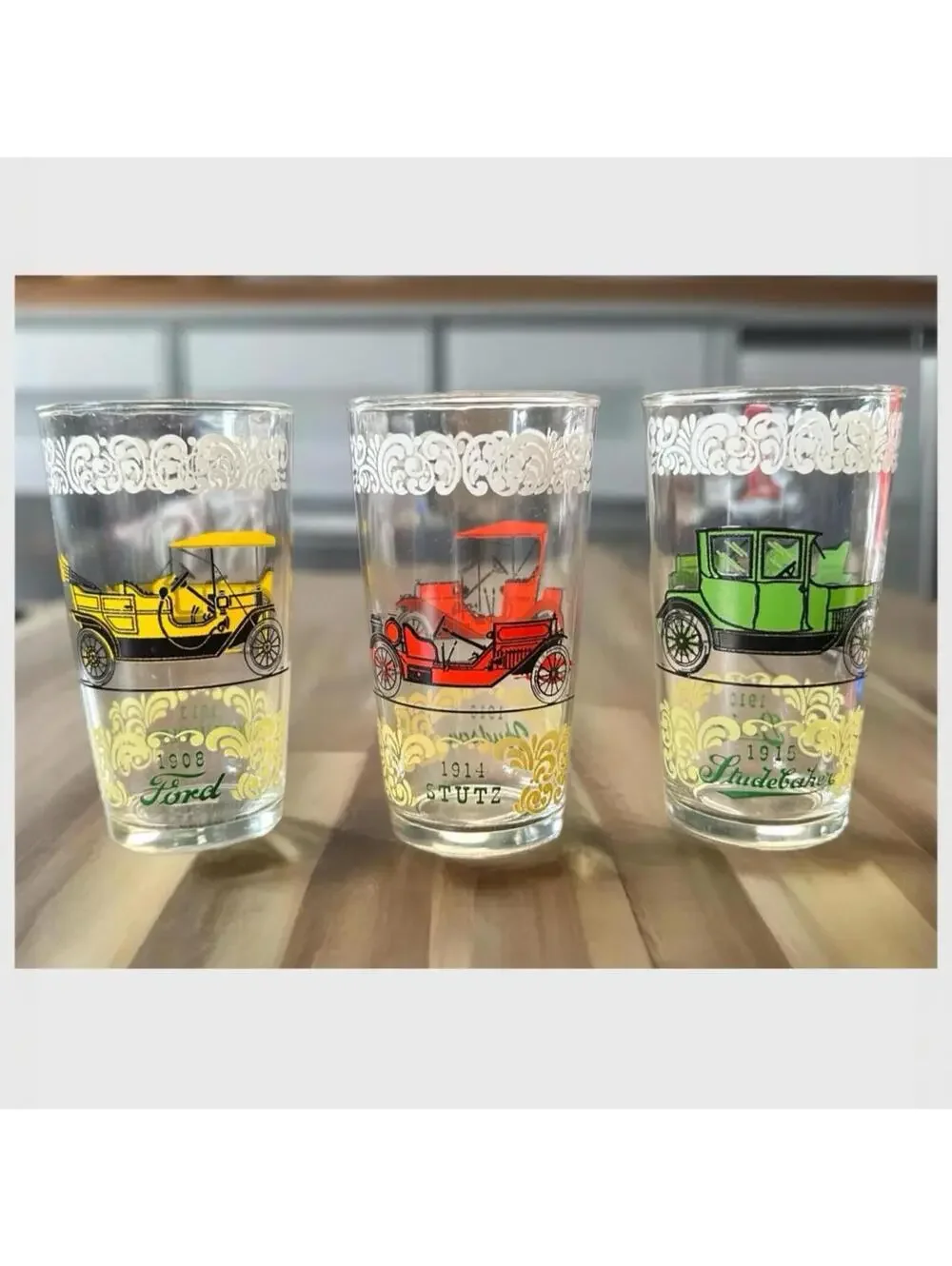 Vintage glass tumblers with early automobile designs 3